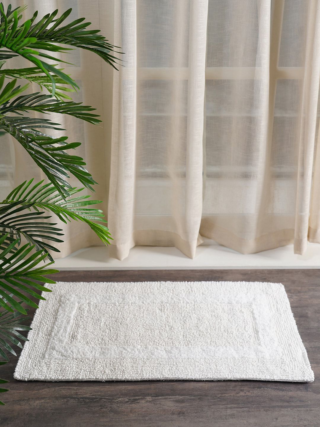 Pure Home and Living White Self-Design GSM 300 Cotton Bath Rug