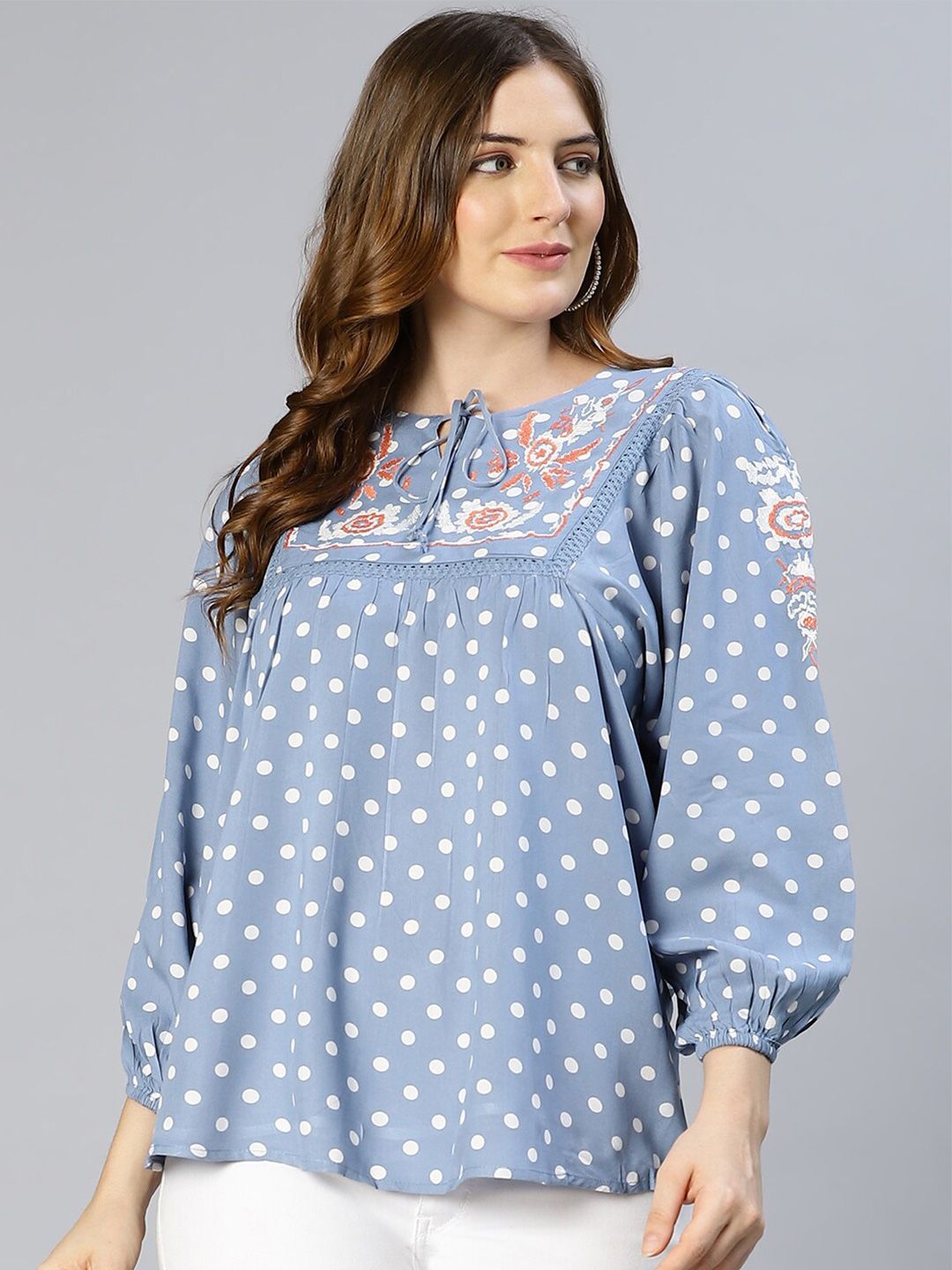 Oxolloxo Women Blue Polka Dot Printed Tie-Up Neck Top Price in India