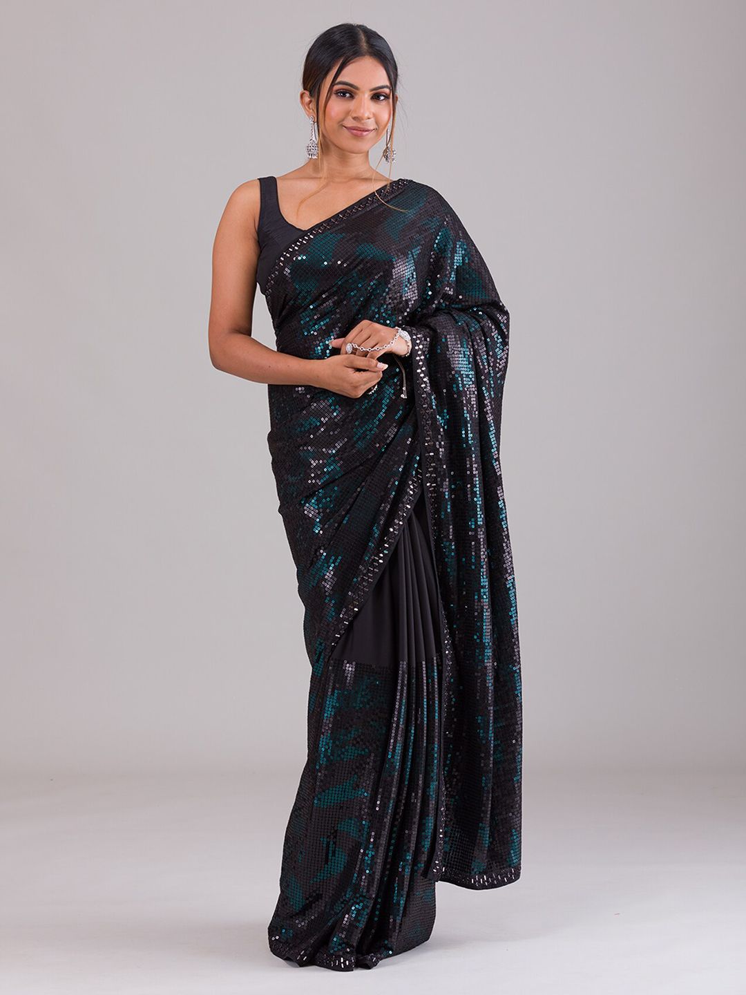 Koskii Black & Green Embellished Sequinned Saree Price in India
