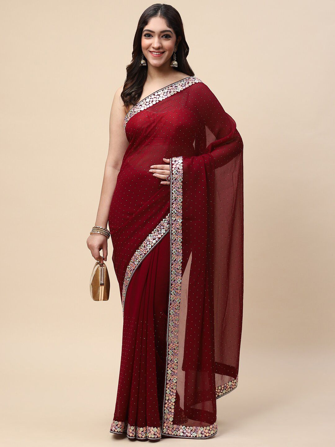 Meena Bazaar Burgundy & Pink Embellished Beads and Stones Saree Price in India