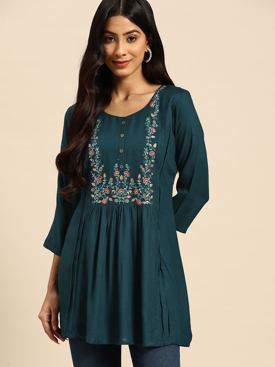 all about you Teal Floral Embroidered Longline Top Price in India