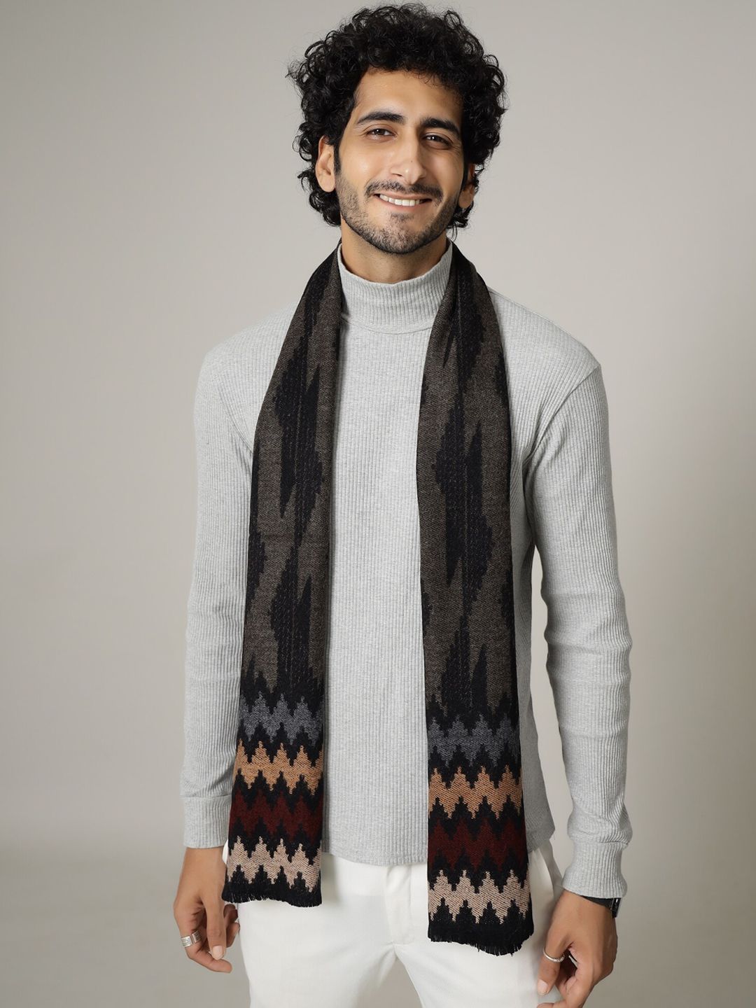 HANDICRAFT PALACE Men Black & Orange Ikat Printed Woolen Mufflers
