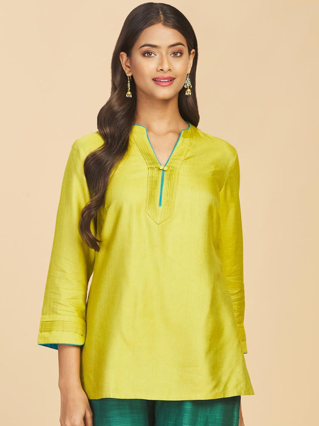 Fabindia Women Lime Green Solid V-Neck Kurti Price in India