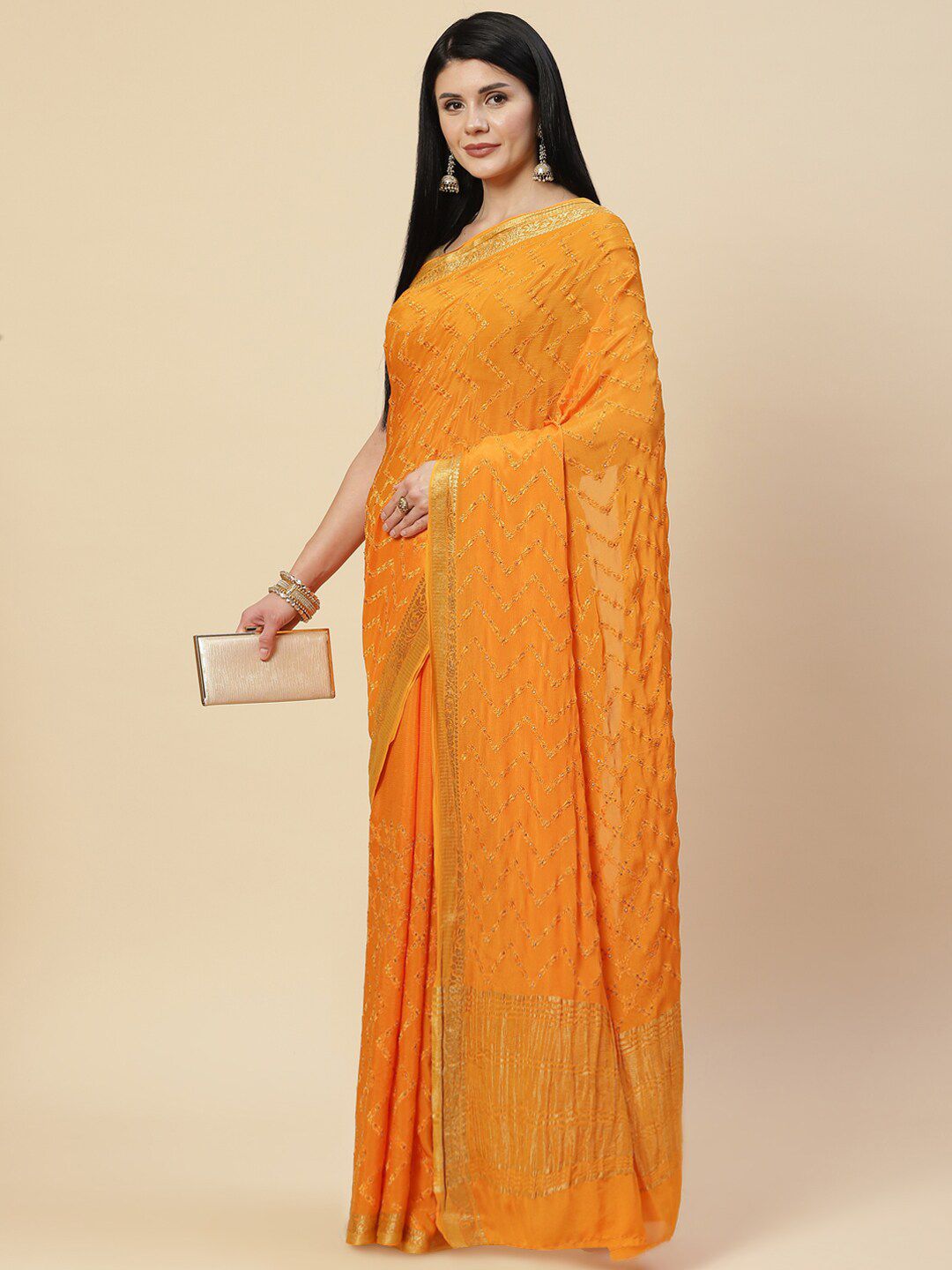 Meena Bazaar Orange & Gold-Toned Embellished Beads and Stones Saree Price in India