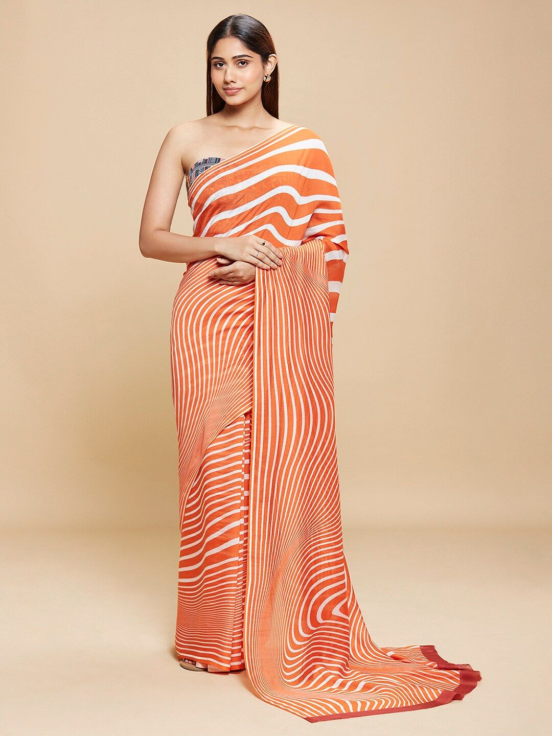 navyasa Orange & White Abstract Printed Saree Price in India