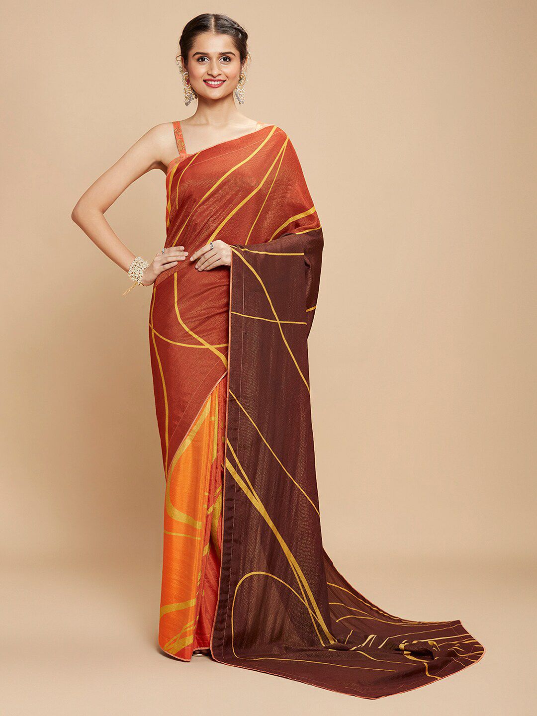 navyasa Orange & Brown Abstract Printed Saree Price in India