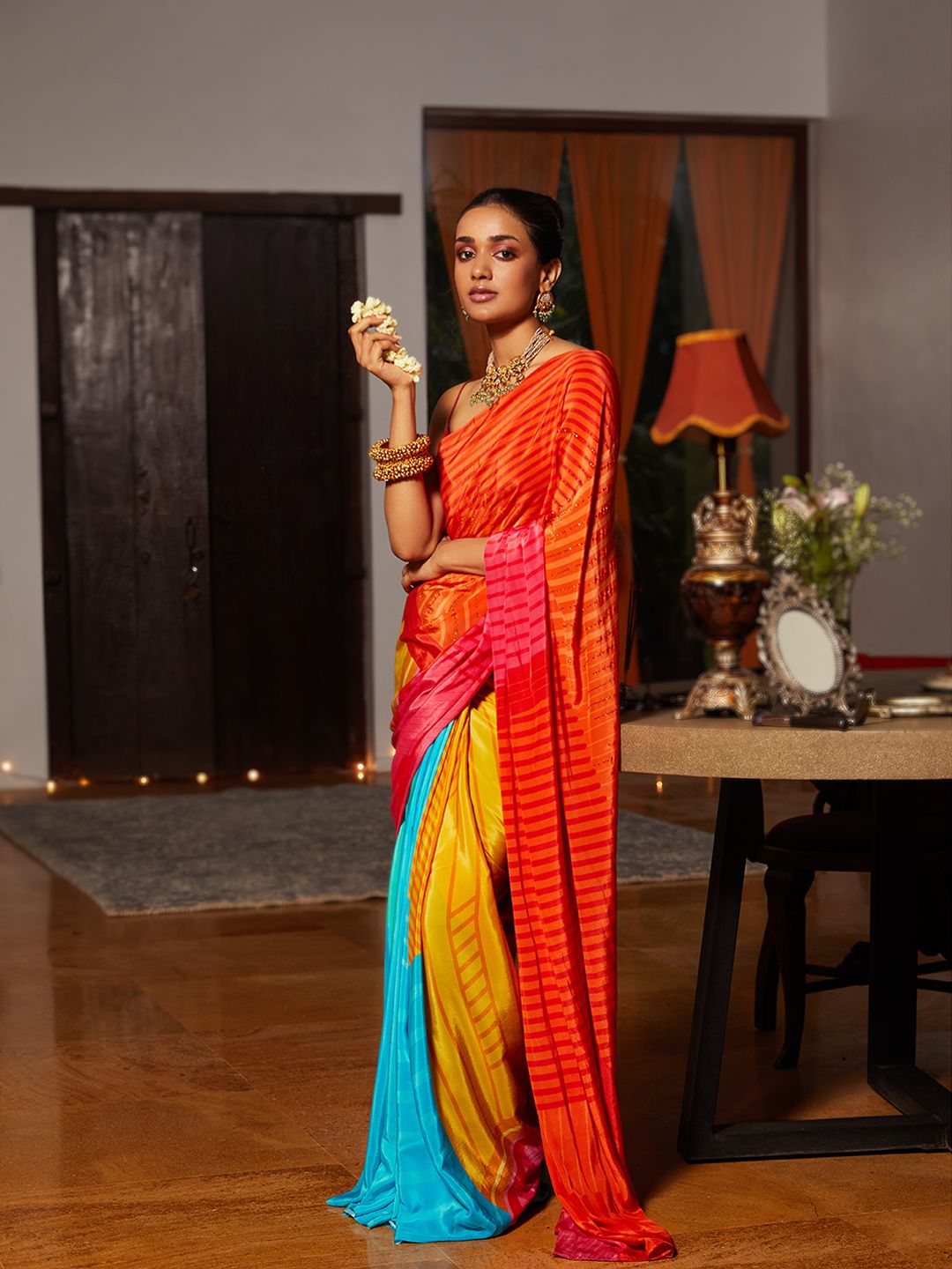 navyasa Red & Blue Colourblocked Saree Price in India