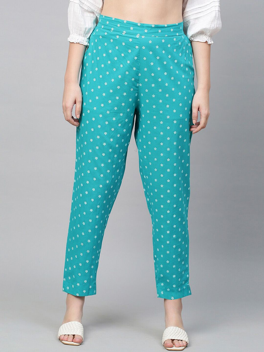 FASHOR Women Turquoise Blue Floral Printed Cotton Straight Fit Trousers Price in India