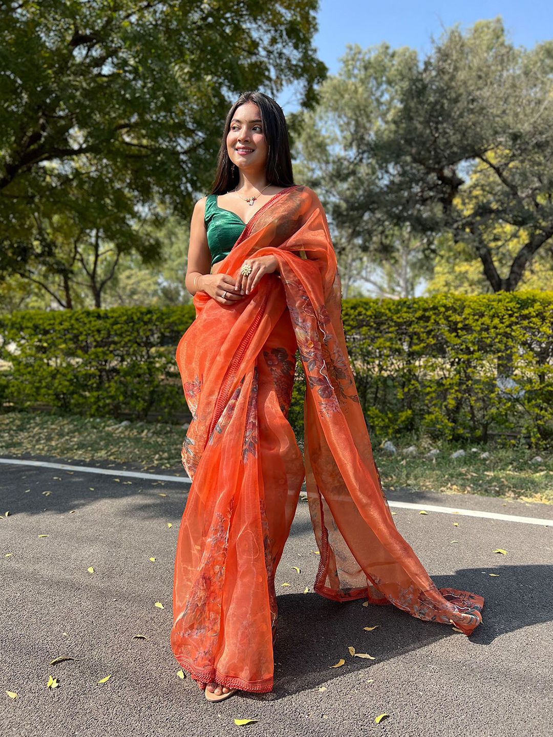 ODETTE Orange & Green Floral Embroidered Organza Saree Price in India