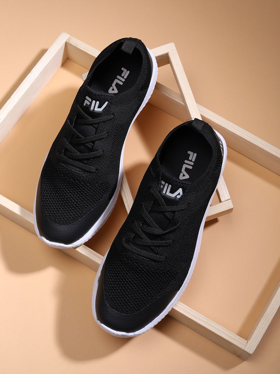 FILA Women Black Textured Sneakers Price in India