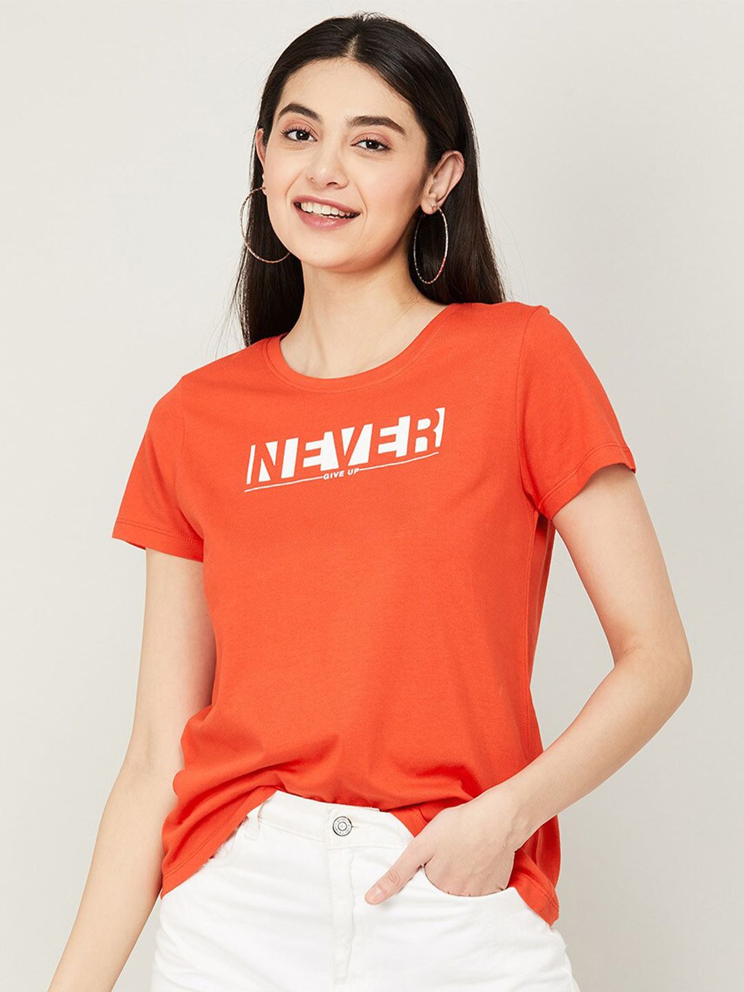 Fame Forever by Lifestyle Orange Printed Pure Cotton Top Price in India