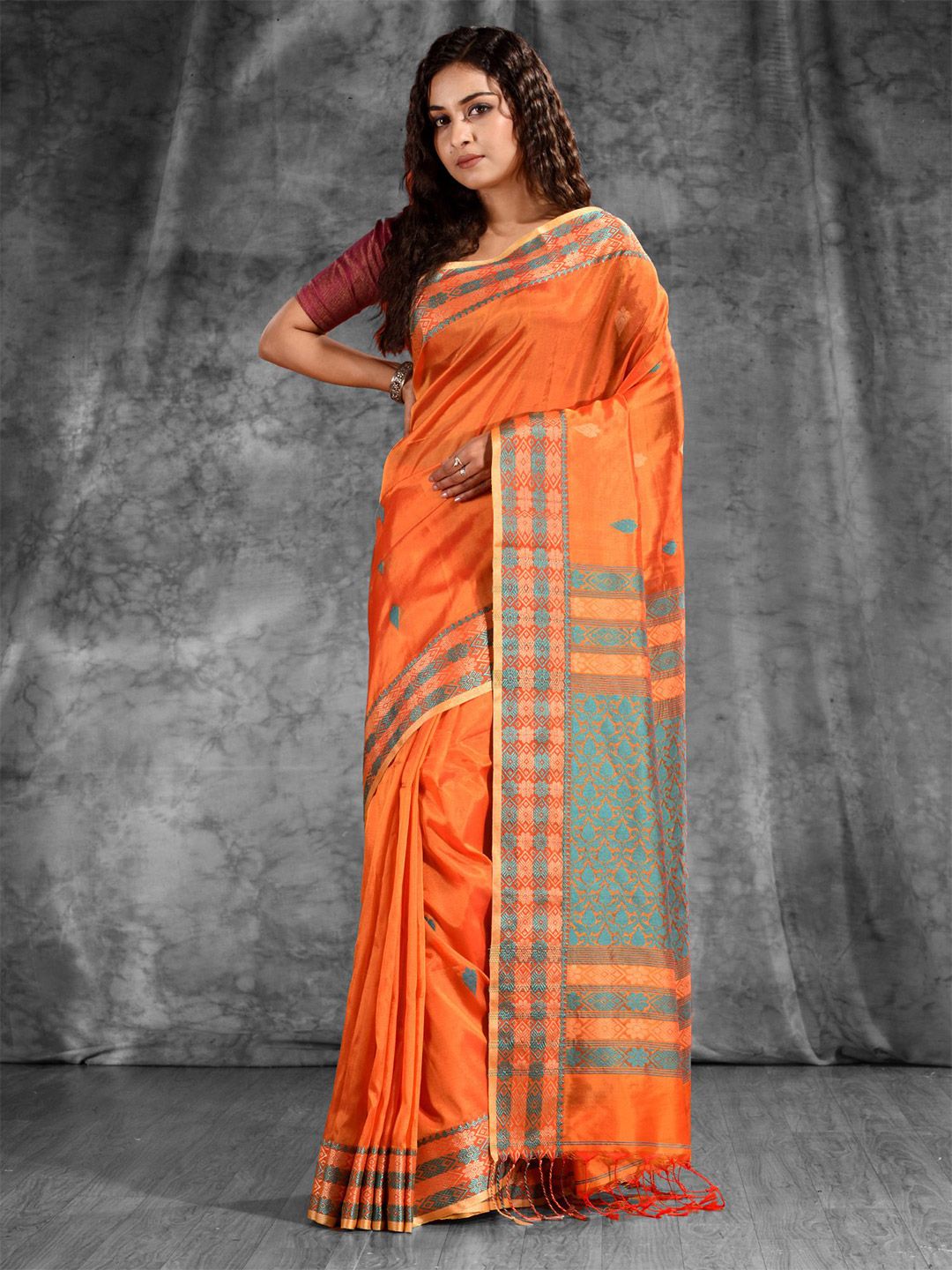 Charukriti Orange & Blue Woven Design Silk Blend Zari Saree Price in India