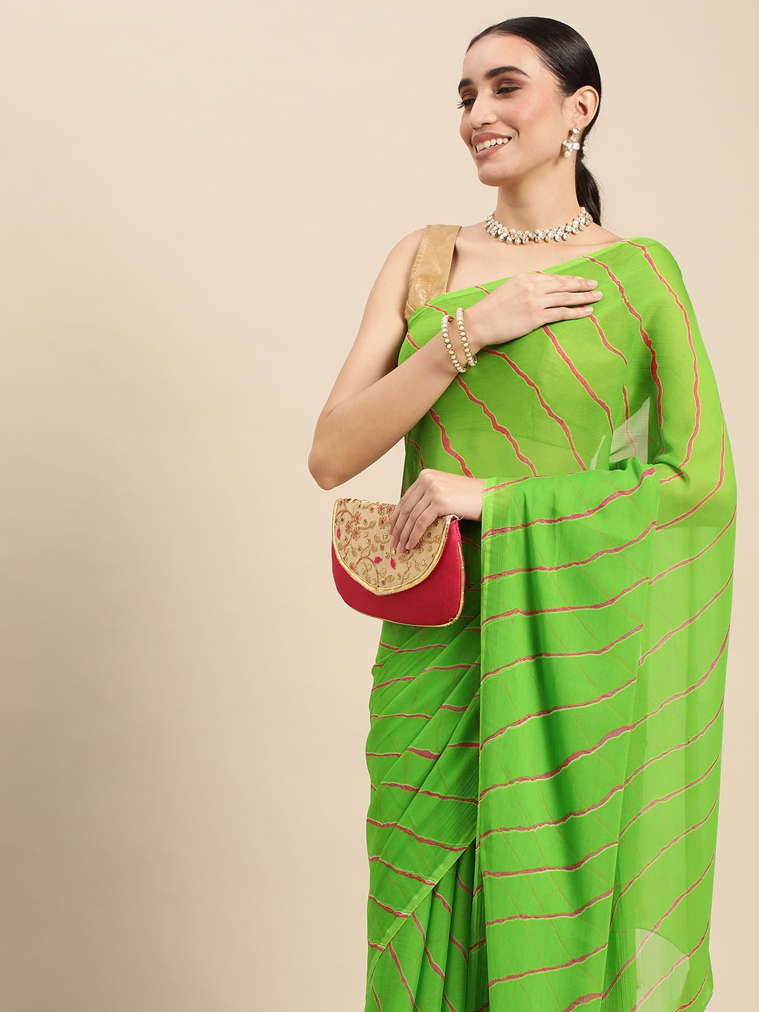 Rani Saahiba Green & Magenta Leheriya Saree Price in India