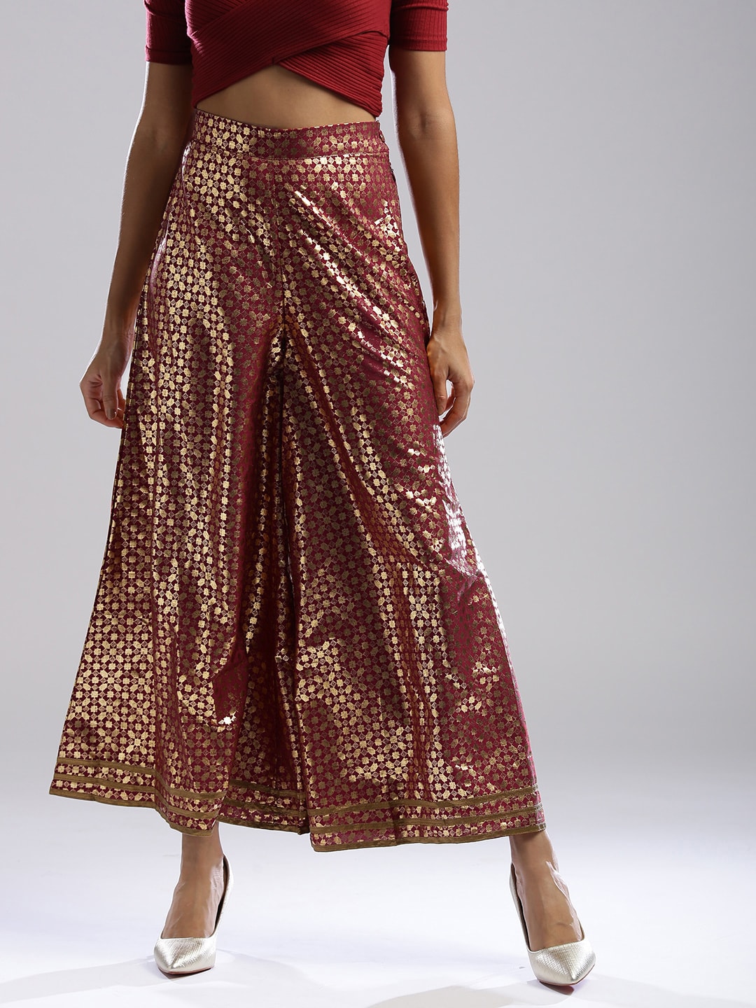 WISHFUL by W Women Red & Golden Printed Flared Palazzos Price in India