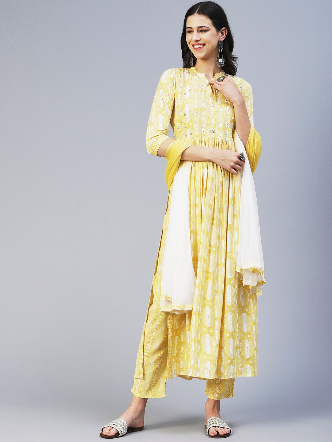 FASHOR Women Yellow Embroidered Pleated Mirror Work Kurta with Trousers & With Dupatta Price in India