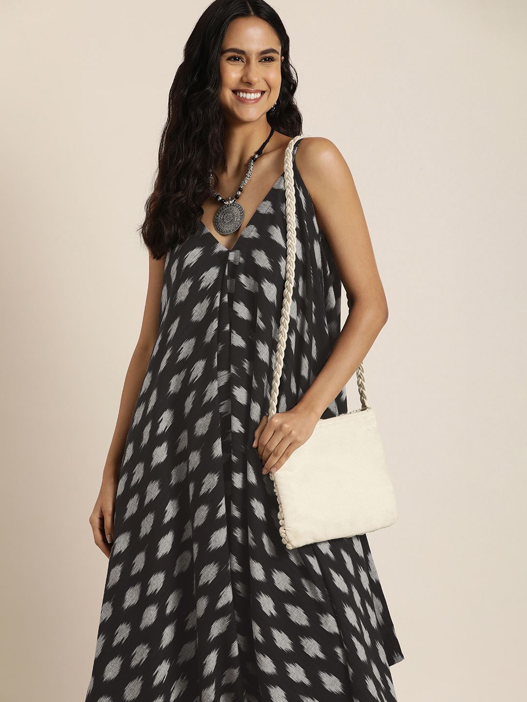 Taavi Ikat Printed Sleeveless Flared Basic Jumpsuit Price in India