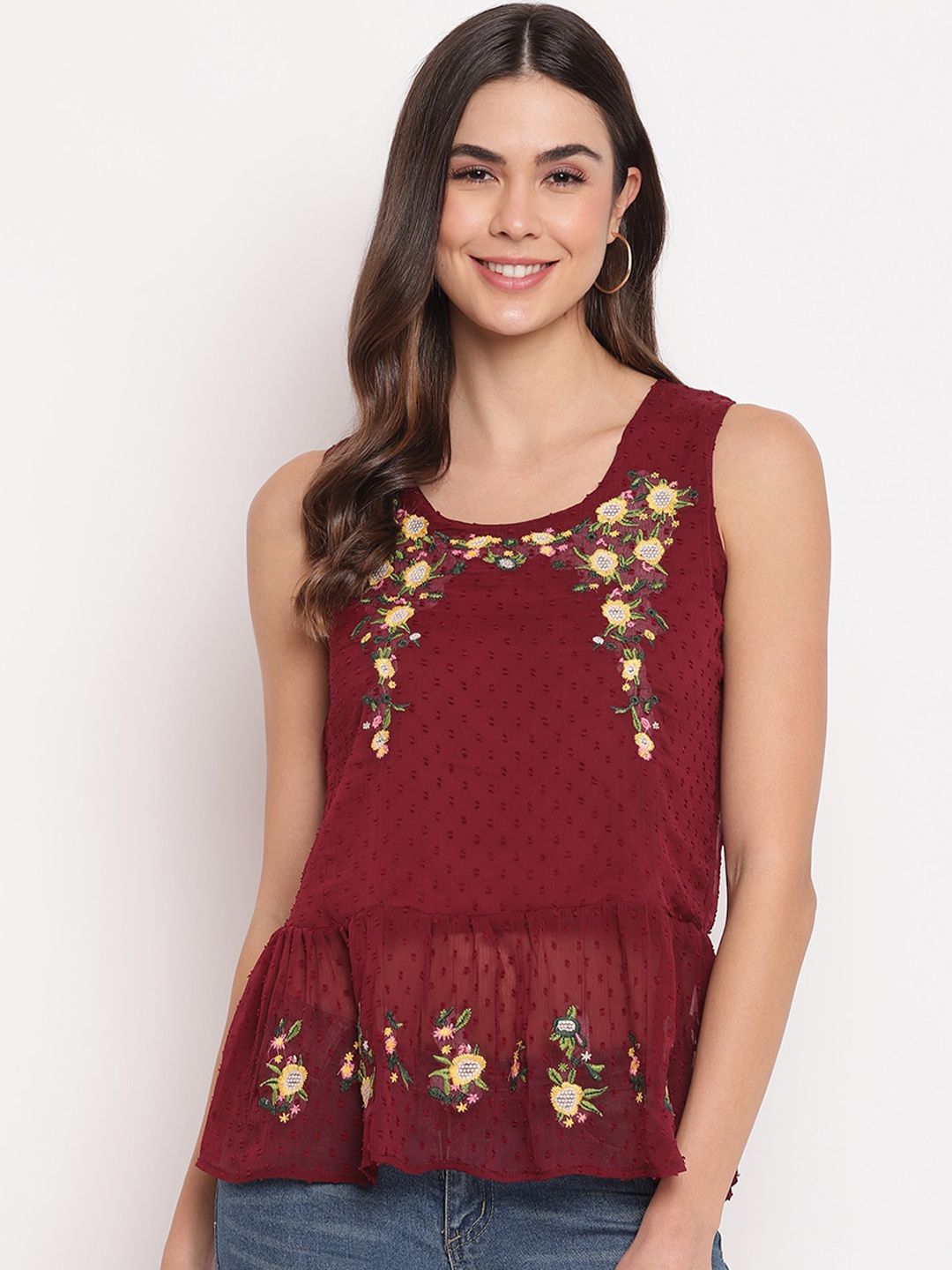 Mayra Floral Embroidered Sleeveless Peplum Top Price in India