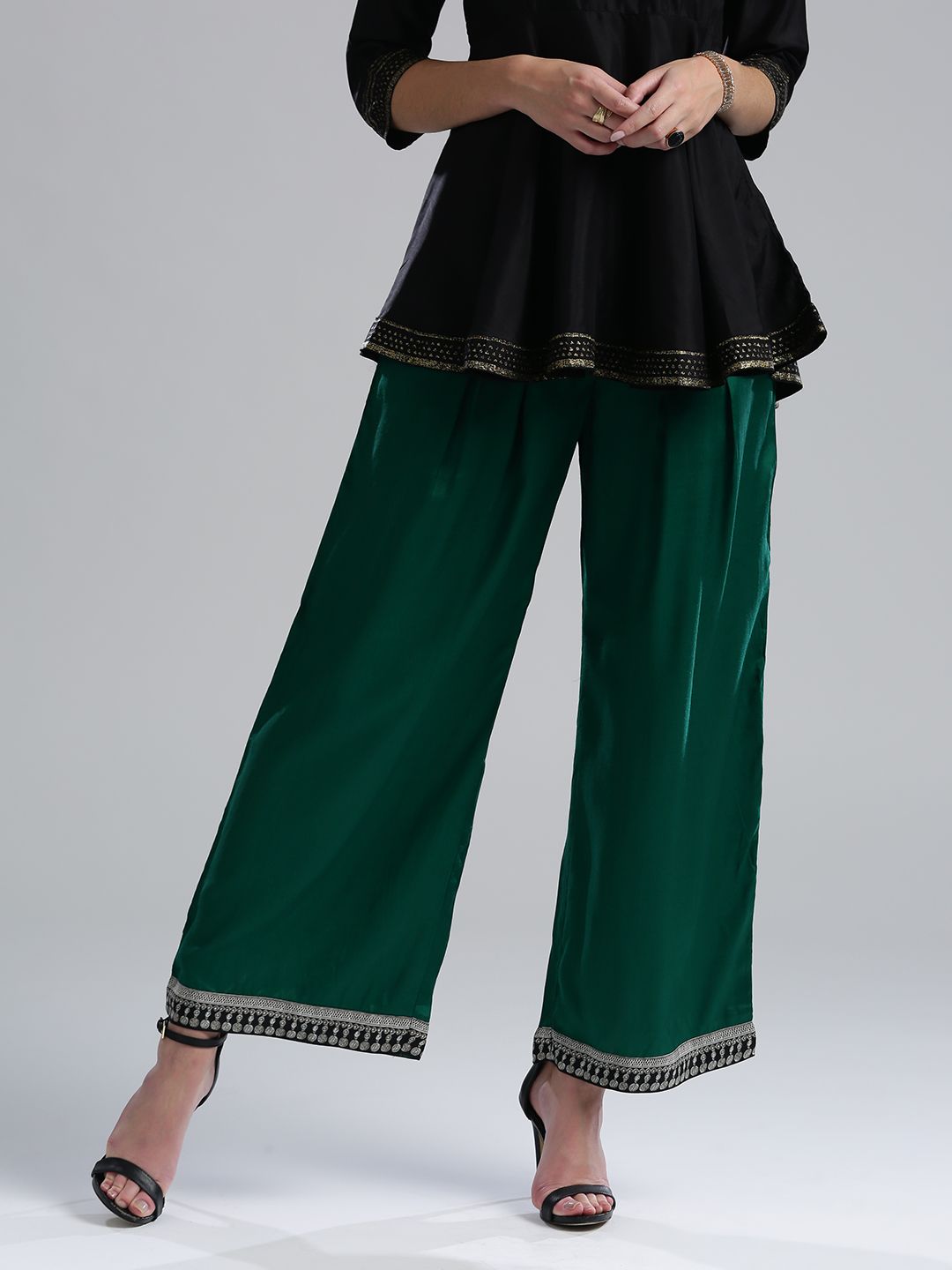 WISHFUL by W Women Green Regular Fit Solid Parallel Trousers Price in India