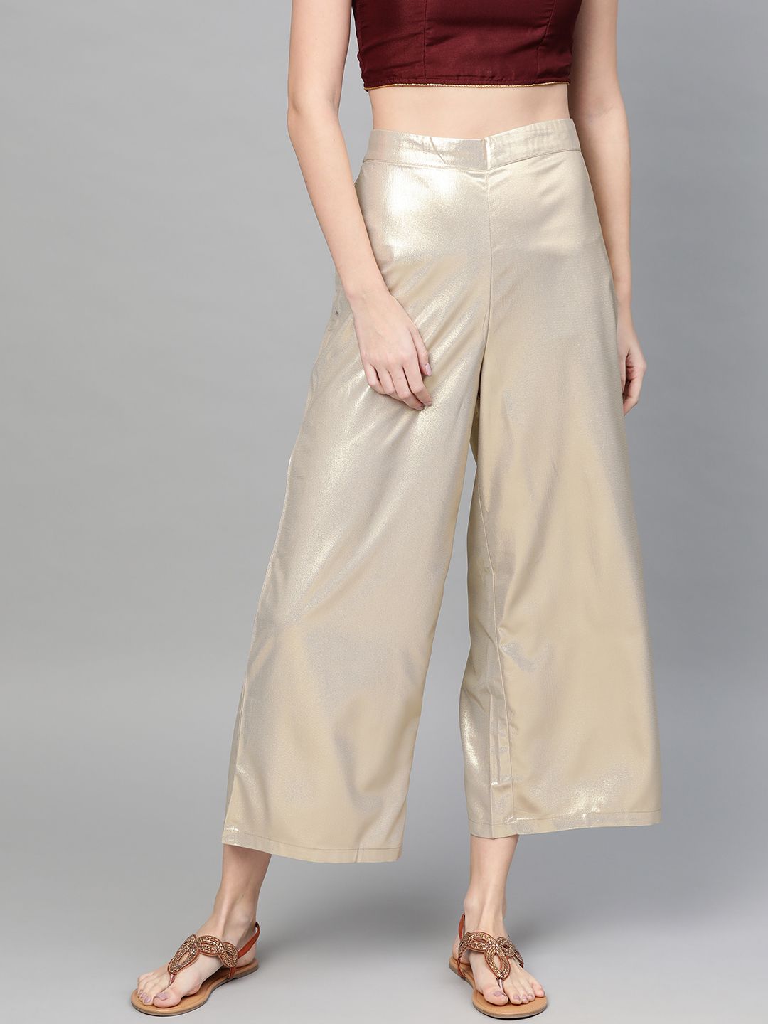 W Women Golden Solid Wide Leg Palazzos Price in India