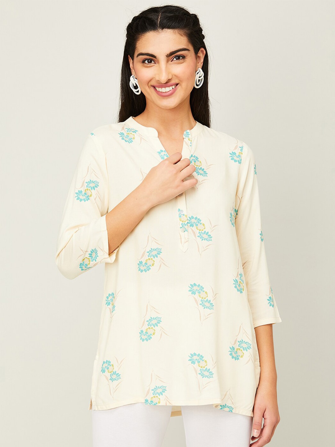 Melange by Lifestyle Mandarin Collar Floral Printed Straight Kurti Price in India