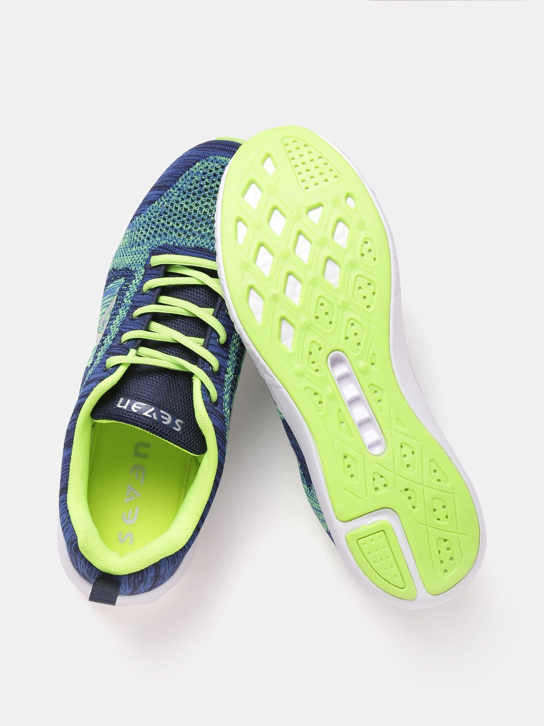 Buy SEVEN by MS Dhoni Men Blue & Fluorescent Green Vulcan