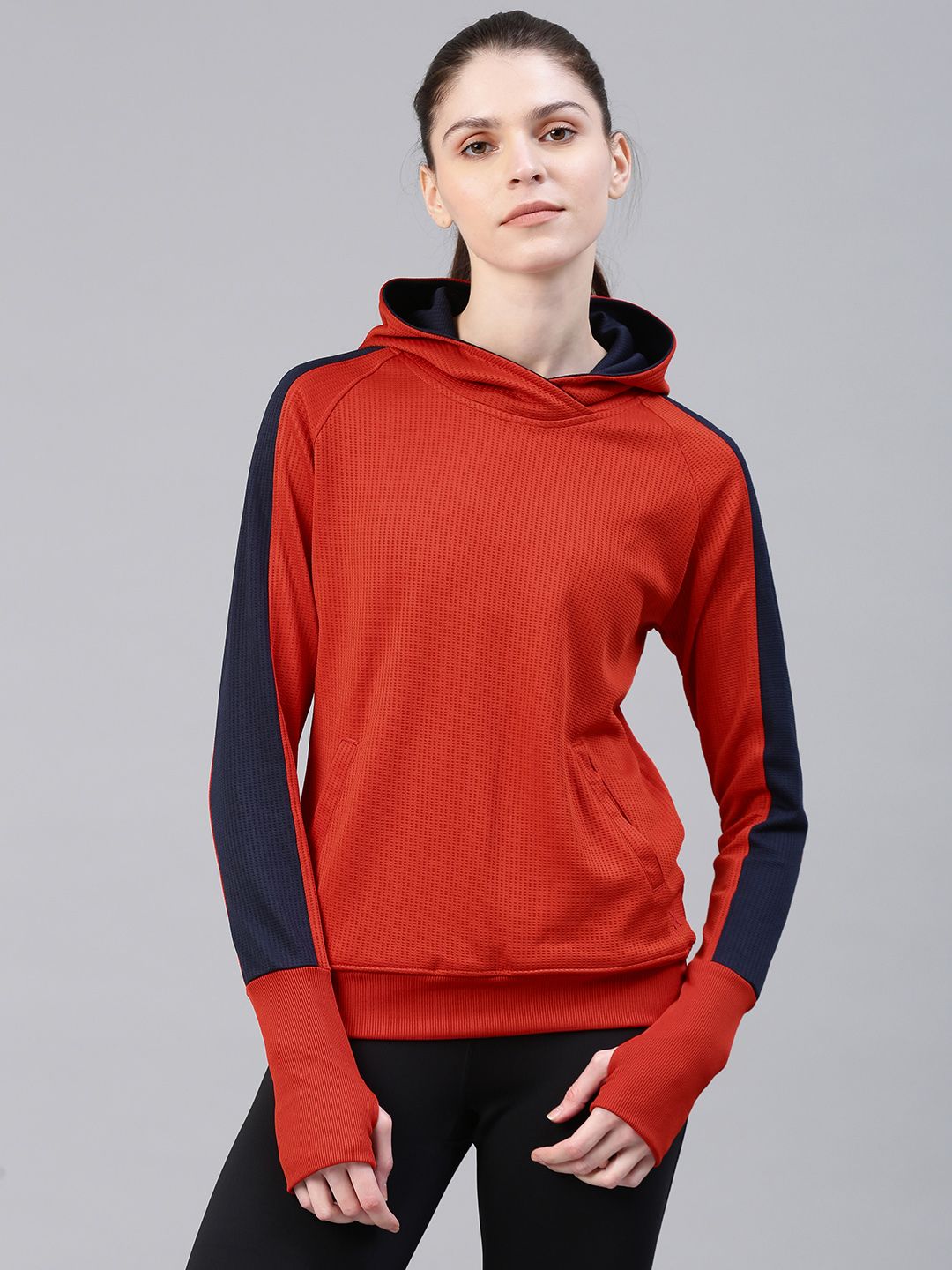 HRX by Hrithik Roshan Women Rust Red Self Design Hooded Sweatshirt Price in India