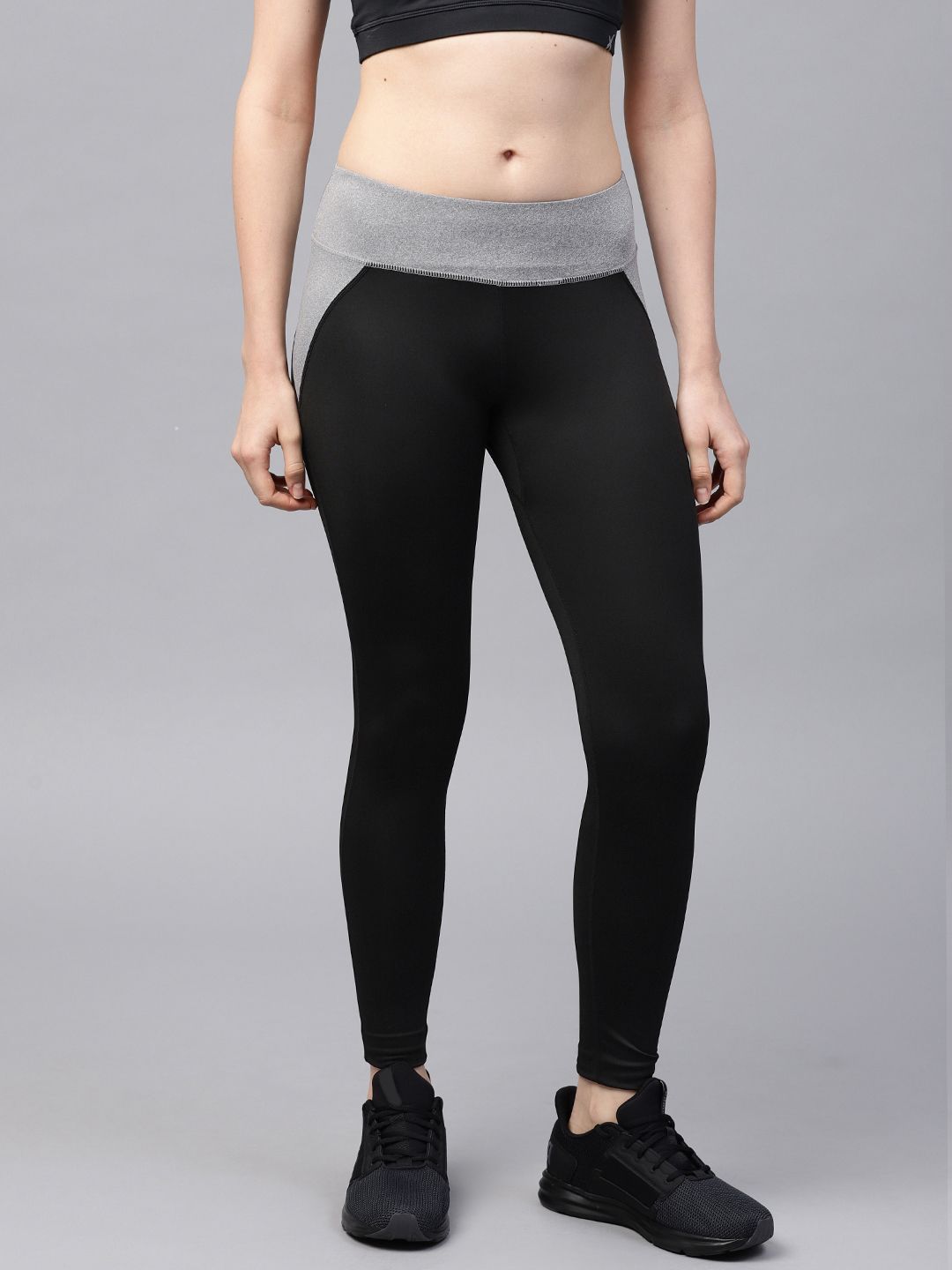 HRX by Hrithik Roshan Women Black Solid Tights Price in India
