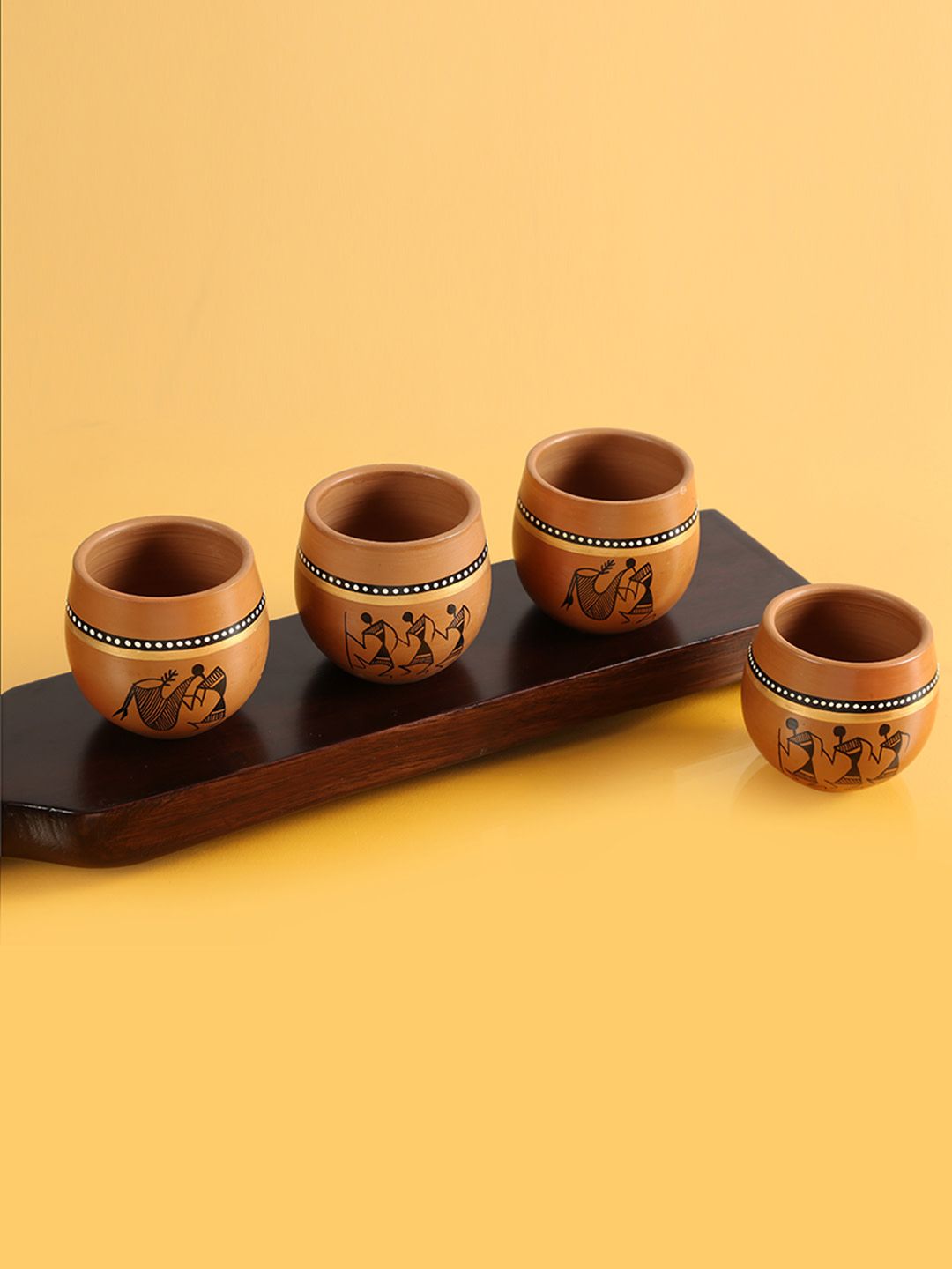 ExclusiveLane Brown 4-Pieces Warli Handpainting Terracotta Kulladhs Set Price in India