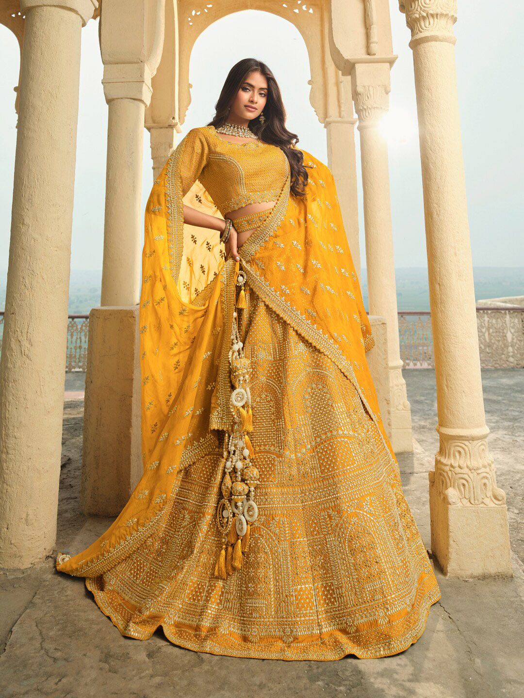 Inddus Mustard Yellow Embroidered Semi-Stitched Lehenga & Unstitched Blouse With Dupatta Price in India