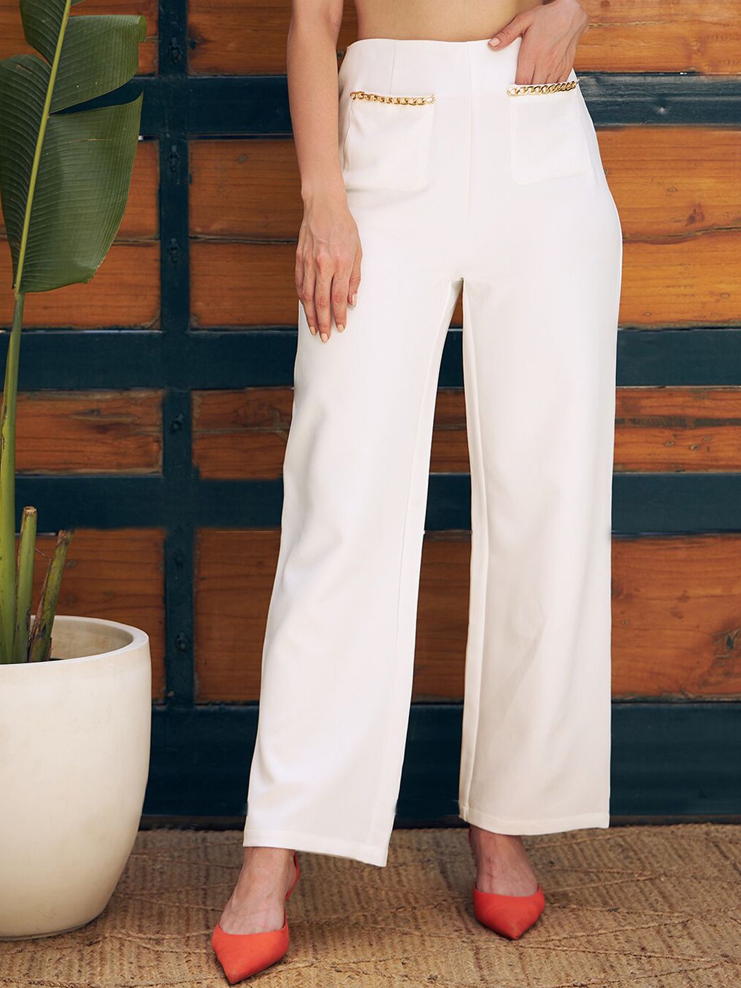 KASSUALLY Women White Embellished Parallel Trousers Price in India