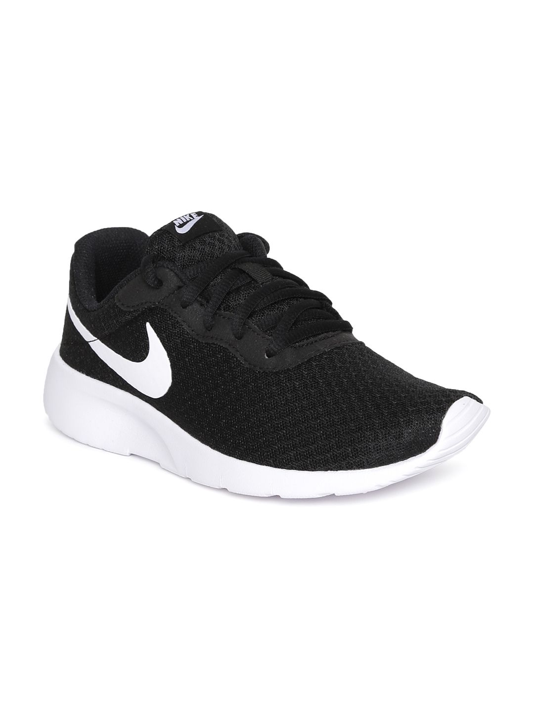 white and black nike tanjun