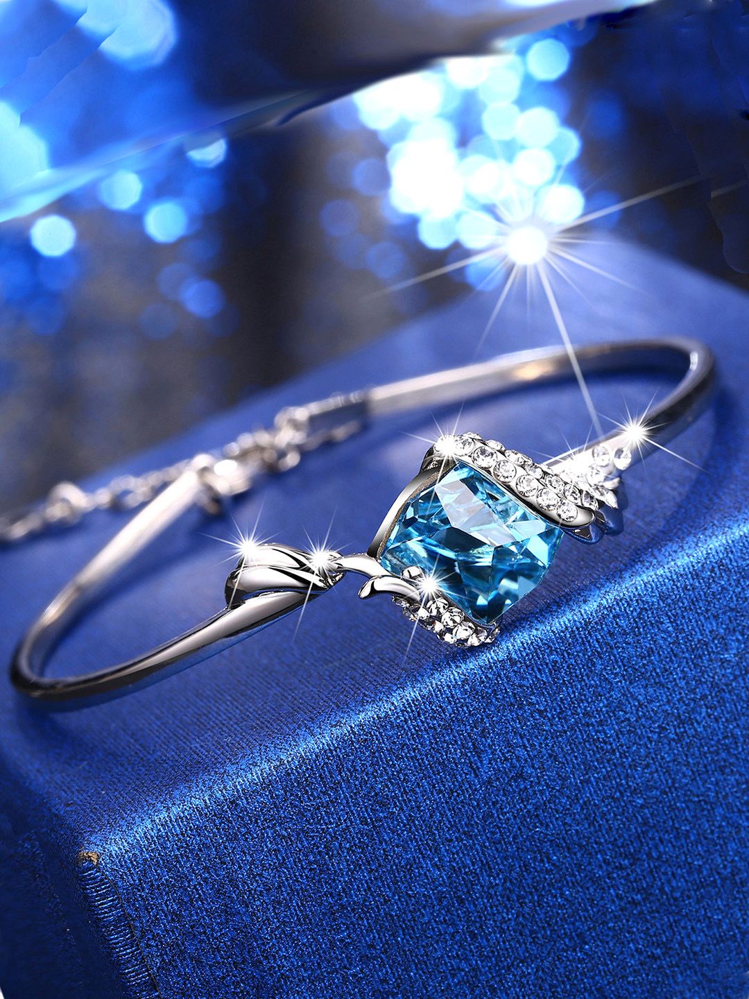 Yellow Chimes Rhodium-Plated Silver-Toned Blue Swaroski Crystal Studded Bracelet Price in India