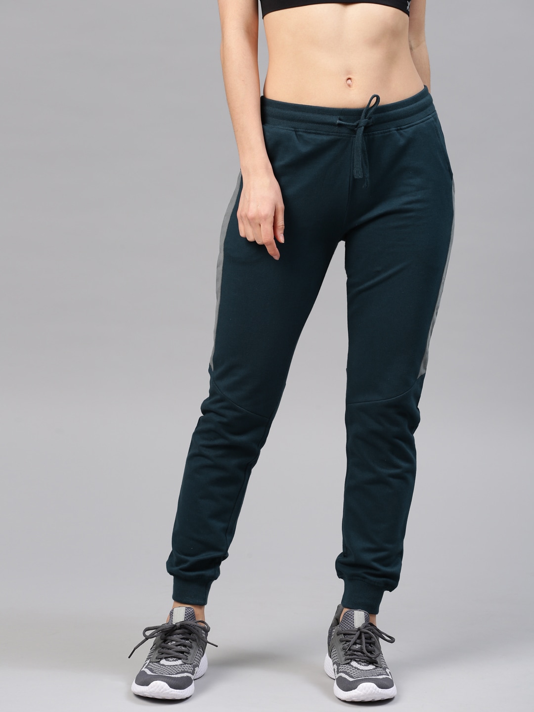 HRX by Hrithik Roshan Women Navy Solid Joggers Price in India