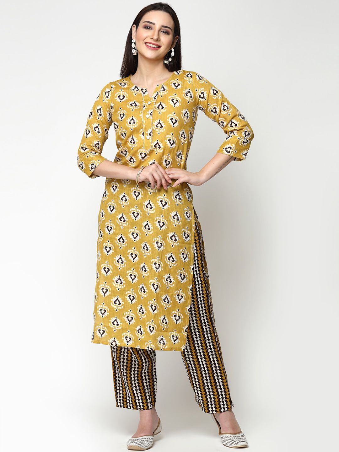 KALINI Women Yellow Floral Printed Regular Pure Cotton Kurta with Trousers Price in India