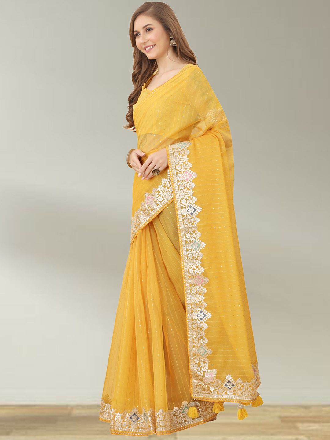 N N ENTERPRISE Yellow Embellished Sequinned Net Saree Price in India