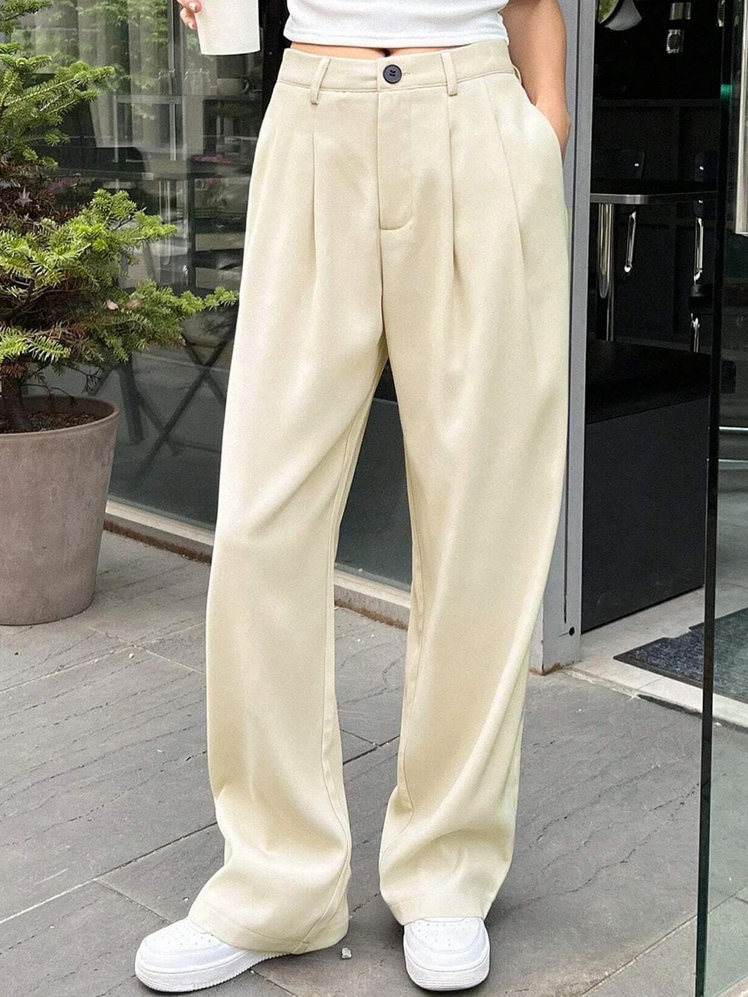 Kotty Women Beige Relaxed Straight Leg Straight Fit High-Rise Easy Wash Pleated Trousers Price in India