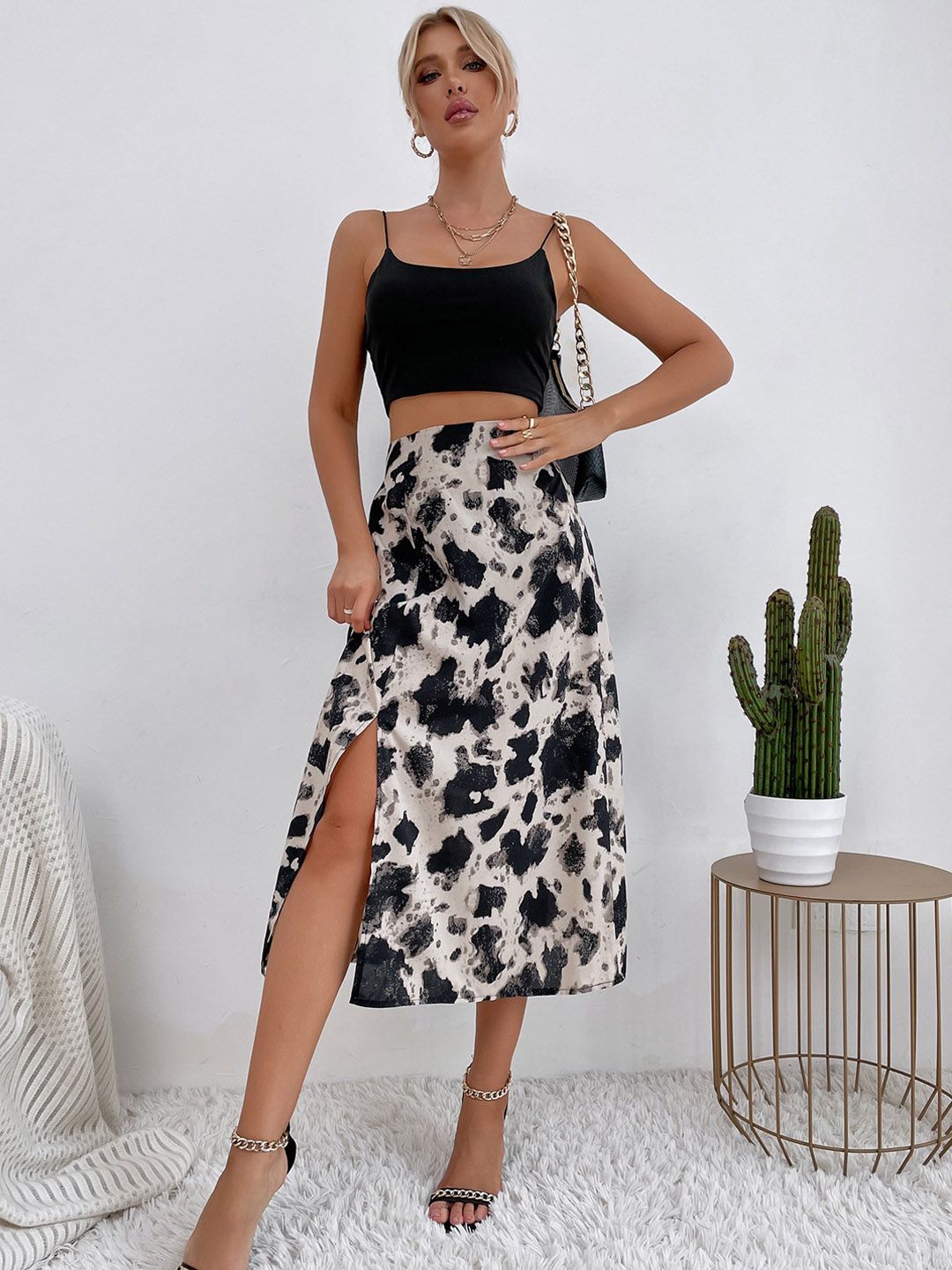 BoStreet Black Abstract Printed A-Line Midi Skirt Price in India