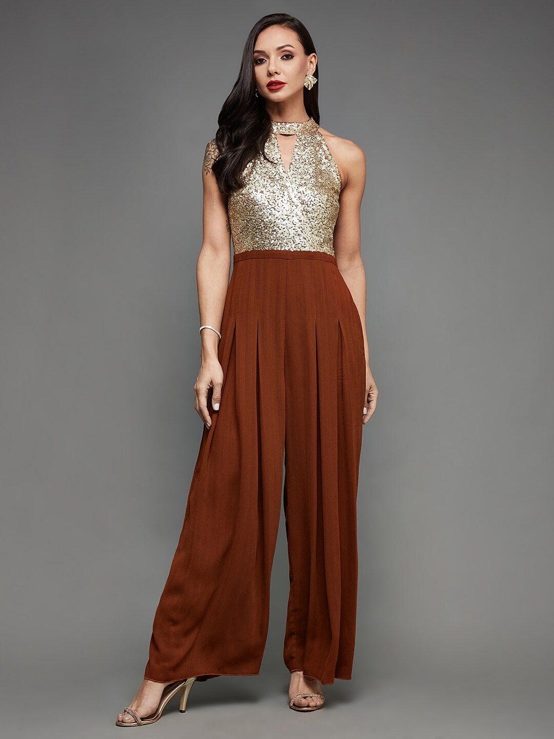 Miss Chase Rust & Gold-Toned Halter Neck Basic Jumpsuit Price in India