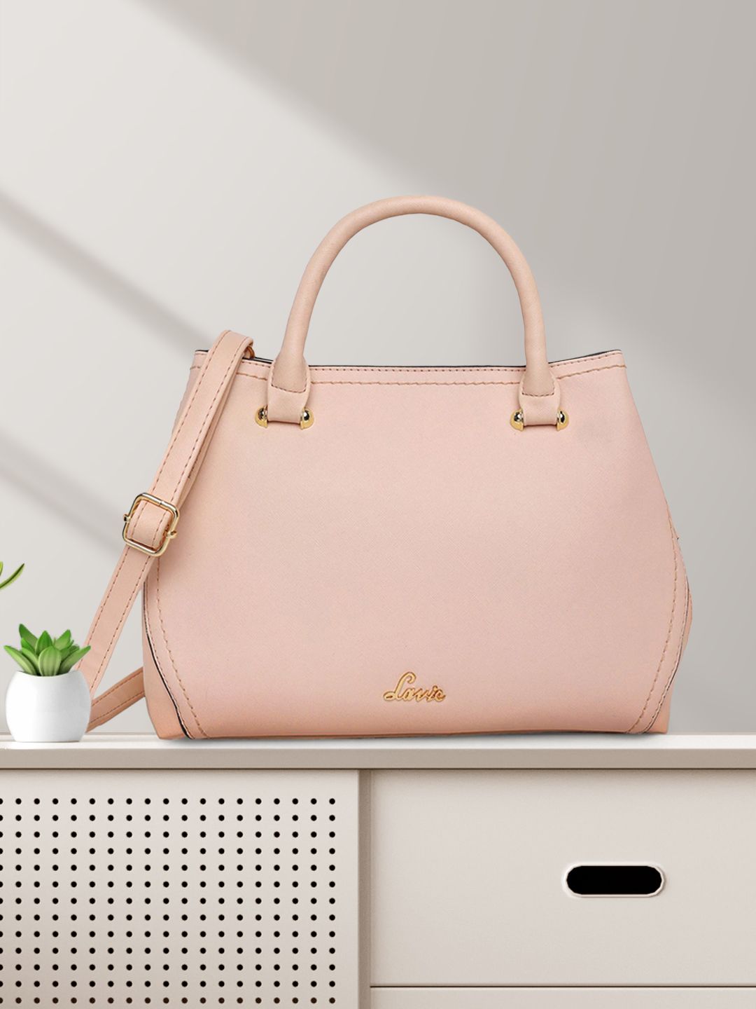 Lavie Pink Solid Handheld Bag Price in India