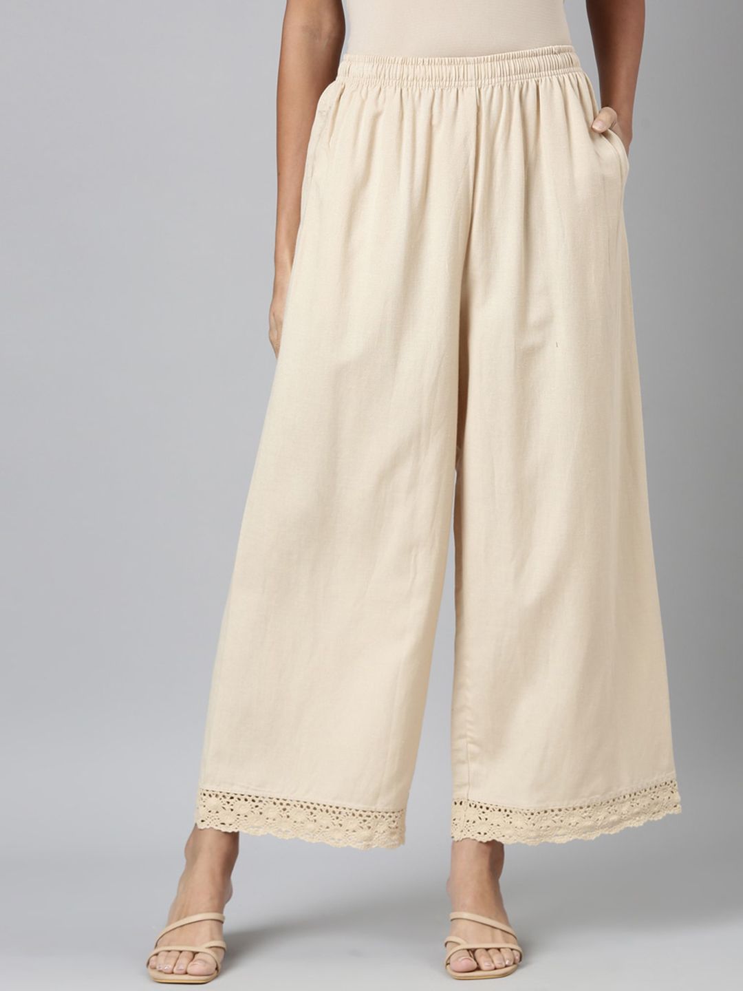 Go Colors Women Beige Trousers Price in India