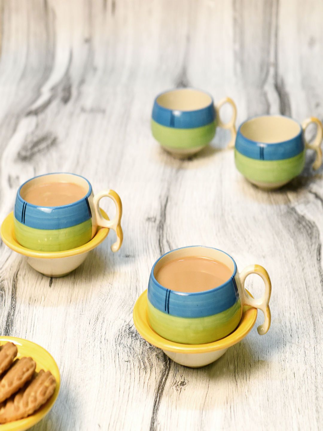 Unravel India Yellow 6-Pieces Printed Ceramic Cups and Saucers Set Price in India