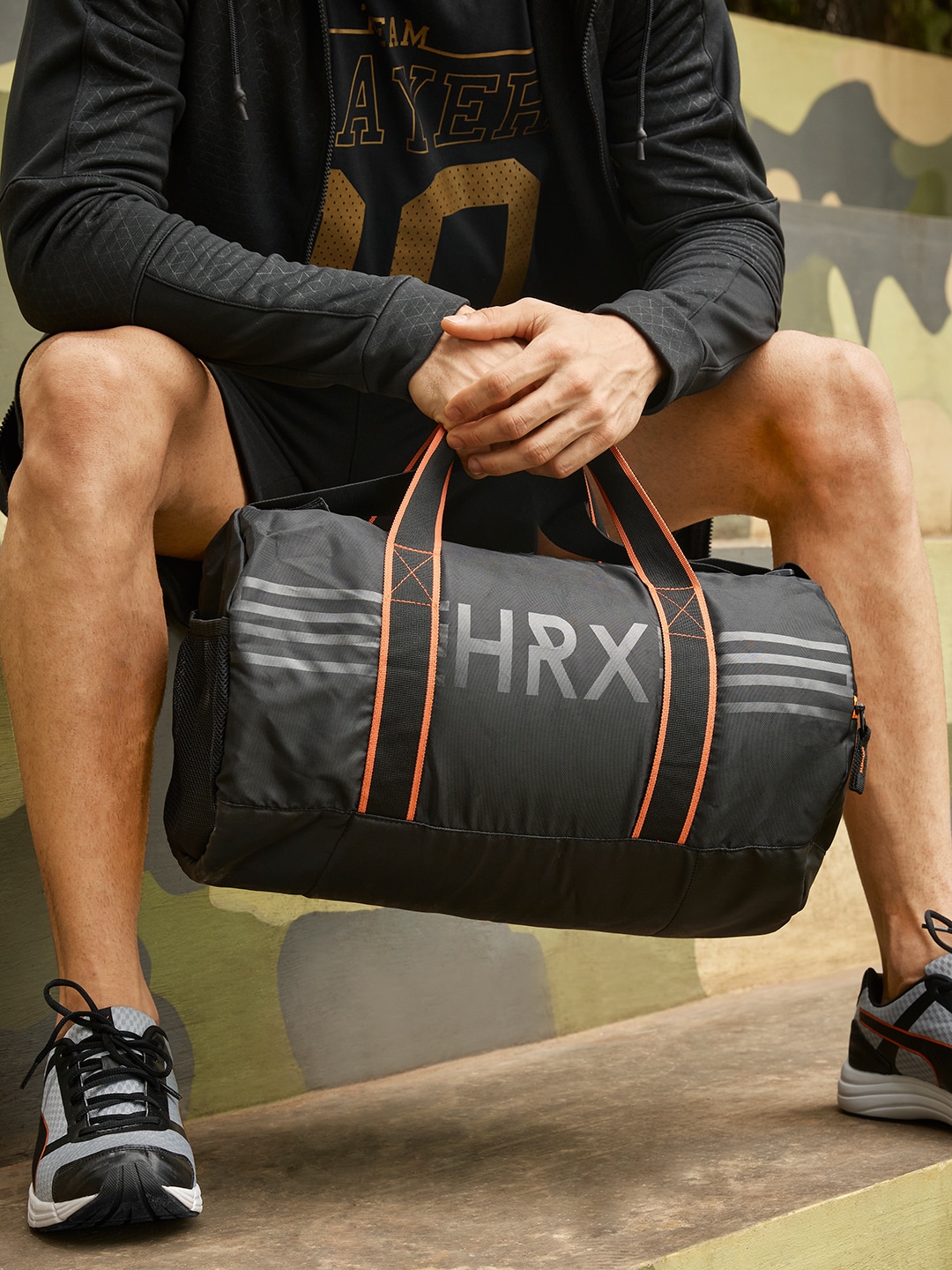 HRX by Hrithik Roshan Unisex Black & Orange Brand Logo Print Training Duffel Bag 26.2 L Price in India