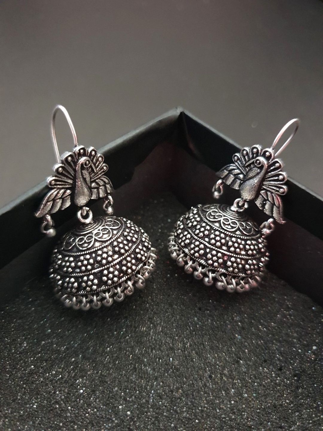 Infuzze Oxidised Silver-Toned Dome Shaped Jhumkas Price in India