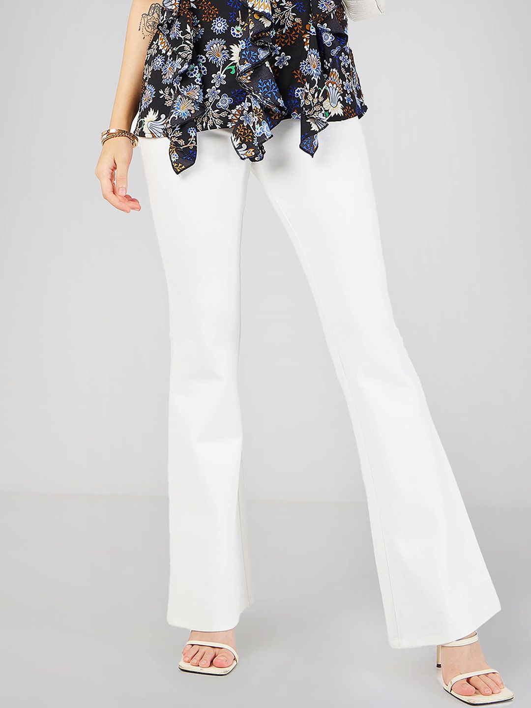 SASSAFRAS Women White Slim Fit Mid Rise Trousers Price in India