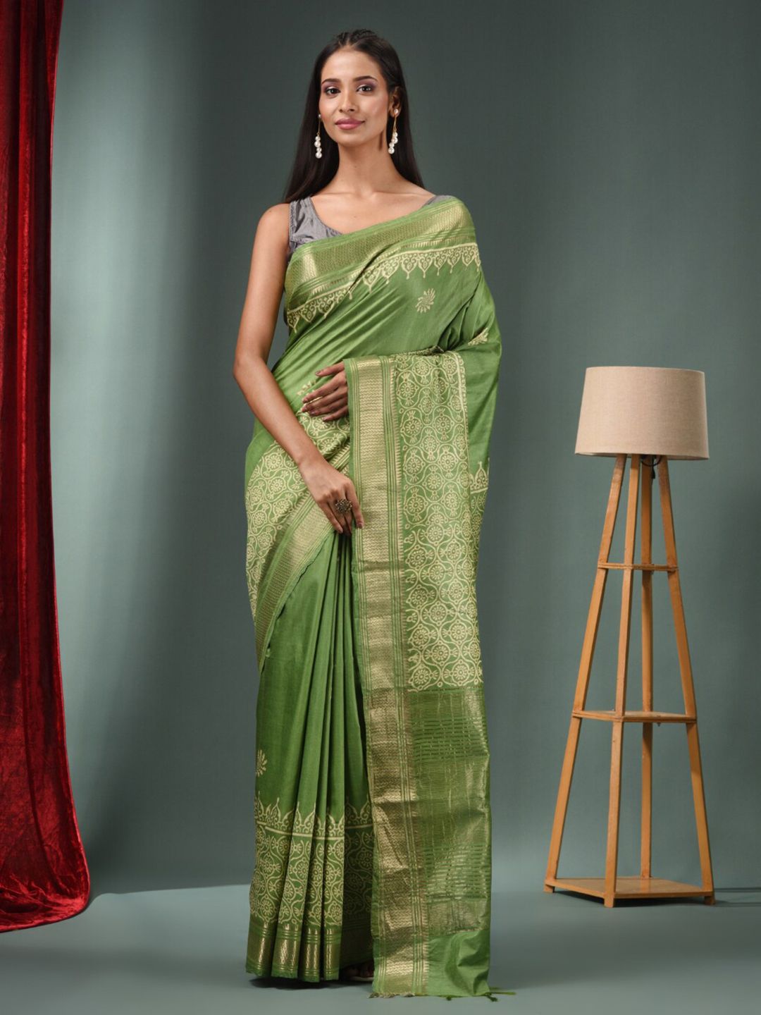Charukriti Green & White Ethnic Motifs Zari Silk Blend Saree Price in India