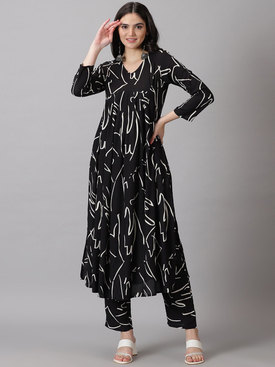 KALINI Abstrct Printed V-Neck Empire Kurta with Trousers