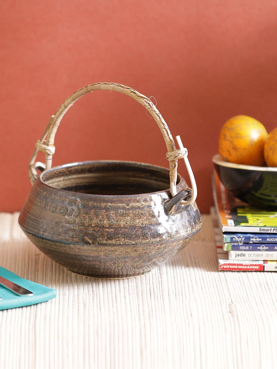 VarEesha Brown Ceramic Handi Serving Bowl with Cane Handle Price in India