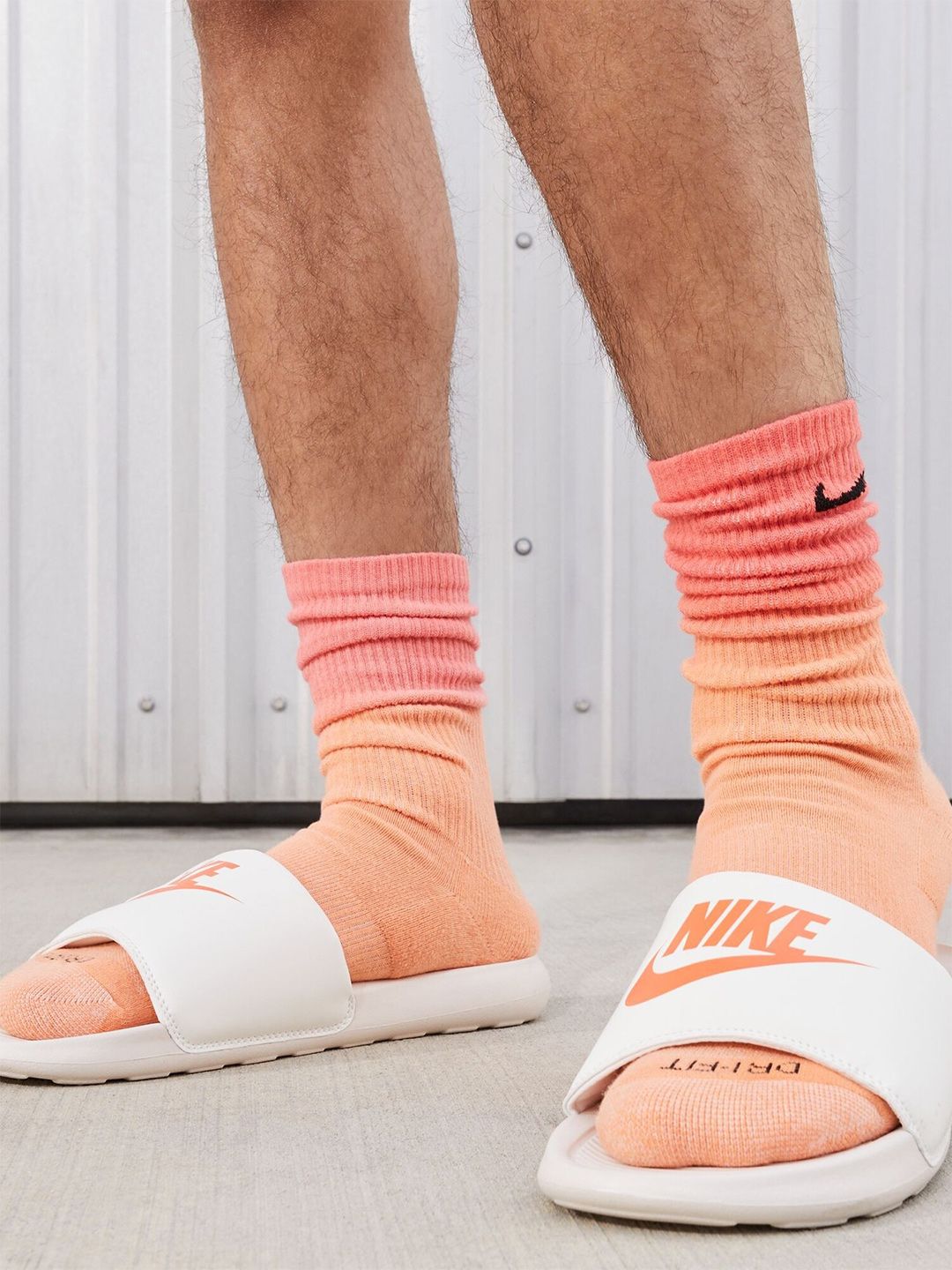 nike victori one slide on feet