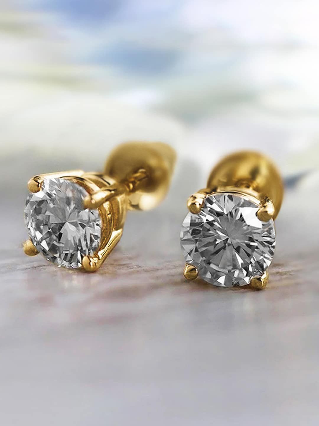Peora Gold Plated Cubic Zirconia Studded Stud Earrings
