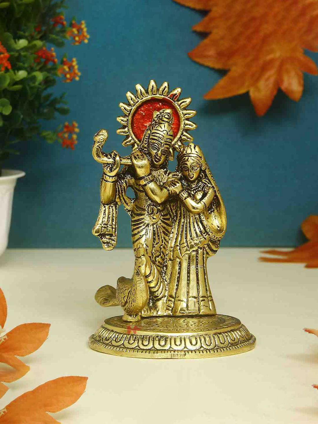 HANDICRAFTS PARADISE Radha Krishna with Peacock Gold Metal Metallic Prayer Room Hand-Crafted Medium Showpiece - 3 Inches